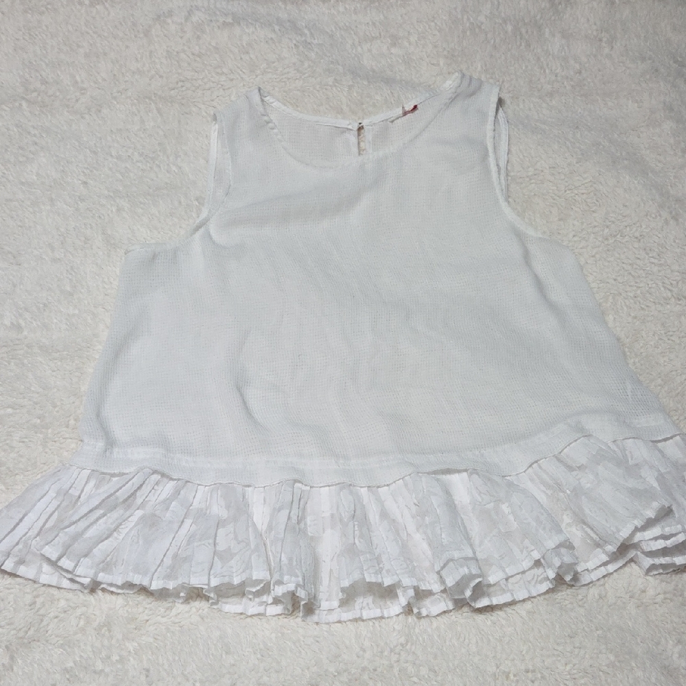 White Sleeveless Top with Ruffle Hem